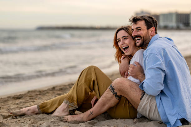 Young couple enjoying a summer day on seashore