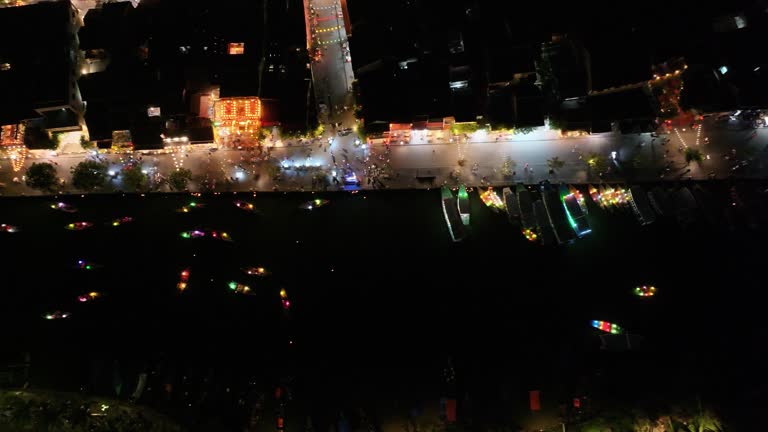 Drone view Lantern festival in ancient town Hoi An at night, Quang Nam province, Vietnam.