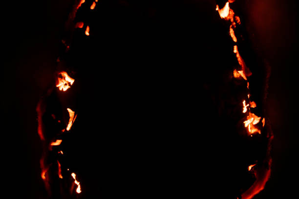 istock burning paper, glowing edge of paper 2148136713