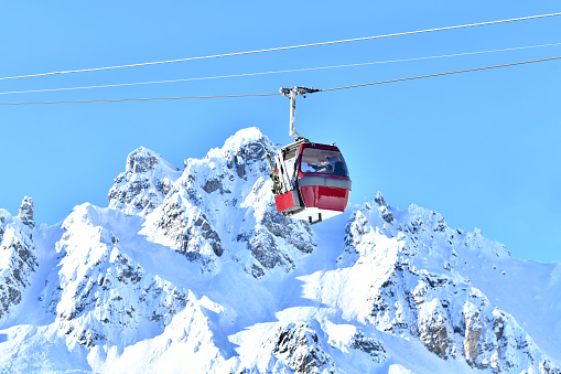 Vintage ski lift on the slopes of French alps.