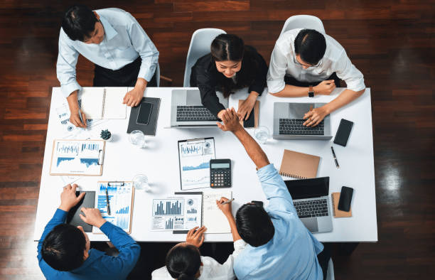 istock Analyst team leader shake hand with colleague after successful meeting. Prudent 2148137304