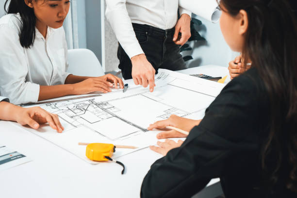 istock Diverse group of civil engineer and client working on architect. Prudent 2148137449