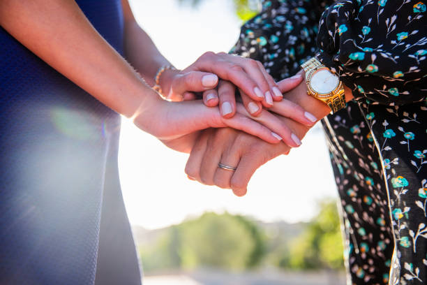 istock Hands placed one above the other as a sign of support, help and compassion 2148137962