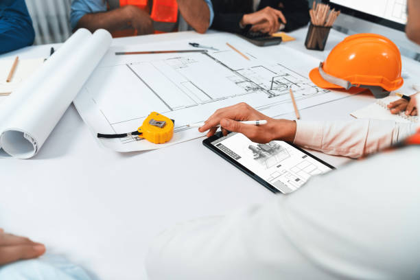 istock Diverse group of civil engineer and client working on architect. Prudent 2148138372
