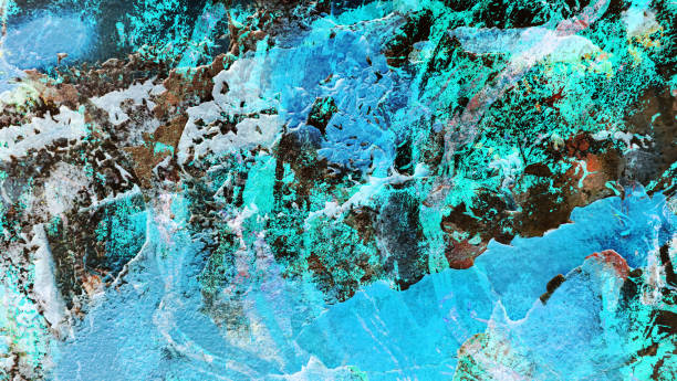 High resolution old weathered polychrome concrete wall detail, coated with multiple layers of various paints, applied through the years randomly one on top of the other, slowly cracking and peeling off, run down by the elements, high resolution grunge background texture stock photo.