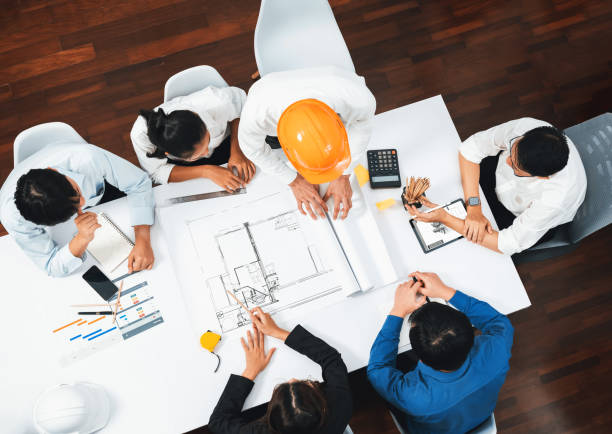 istock Diverse group of civil engineer and client working on architect. Prudent 2148139252