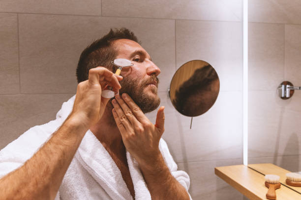 istock White man doing his skin care 2148141348