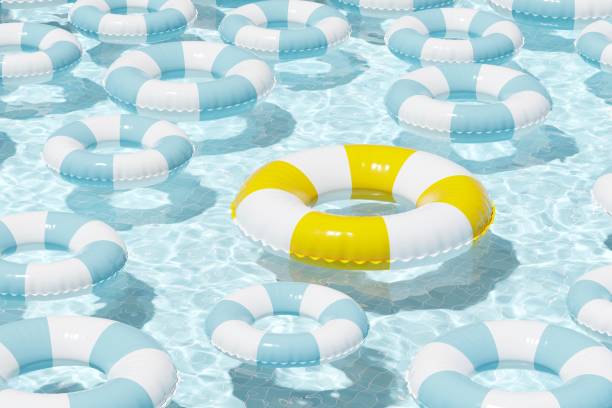 istock Colorful inflatable swim rings in swimming pool for summertime vacation. Summer pattern. 3d illustration, rendering. Background for summer postcard, flyer, poster. 2148141810