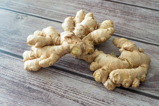 istock Fresh organic ginger roots rhizome on display 2148145204