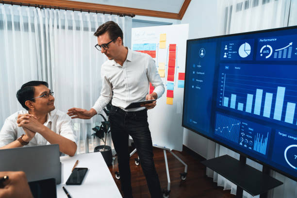 istock Presentation in office or meeting room with analyst team. Prudent 2148149635
