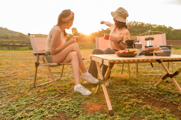 istock young pretty Asian woman  enjoy camping 2148151154