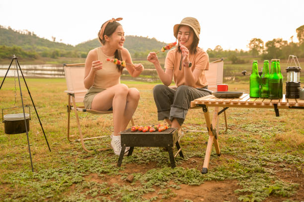 istock young pretty Asian woman  enjoy camping 2148151887