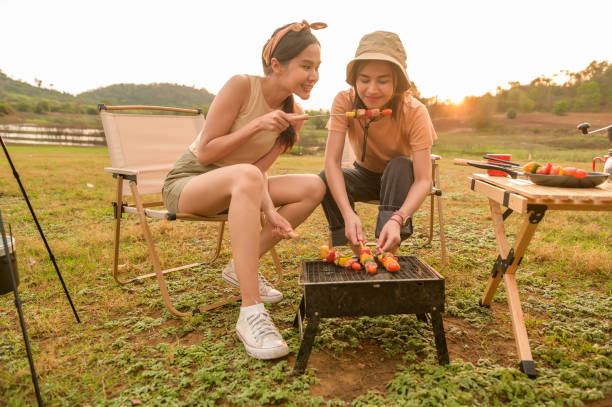 istock young pretty Asian woman  enjoy camping 2148151904