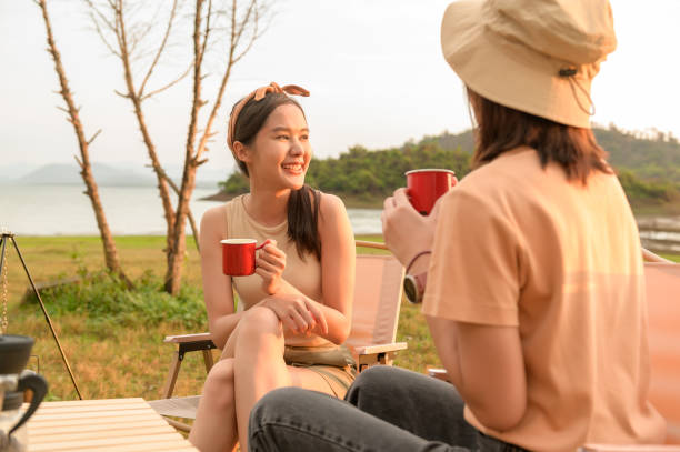 istock young pretty Asian woman  enjoy camping 2148151975