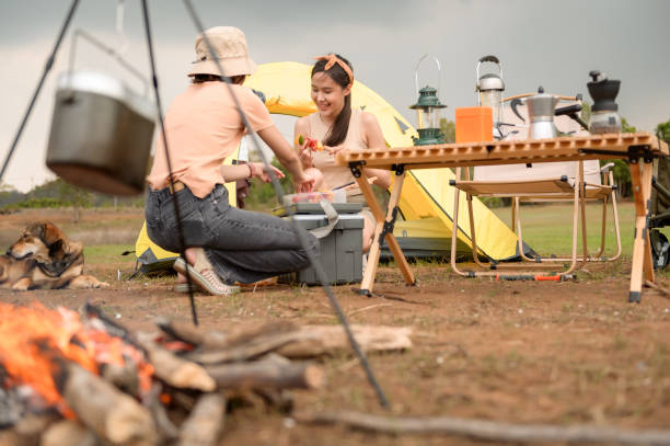 istock young pretty Asian woman  enjoy camping 2148152131