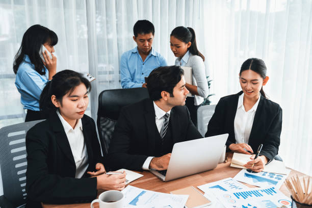 istock Group of business analyst team analyzing financial data report. Habiliment 2148152506