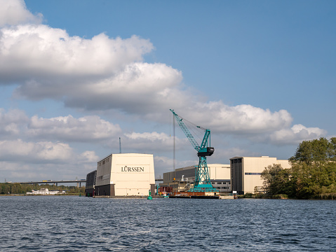 Dry dock of shipyard Lürssen along Kiel Canal, Schleswig-Holstein, Germany