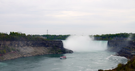 Mesmerizing beauty of Horseshoe Falls on Niagara River aboard tour boat. Get up close to majestic Horseshoe Falls and witness impressive power. Breathtaking charm of Horseshoe Falls