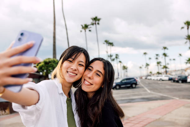 Happy women on summer vacation and shoot a selfie
