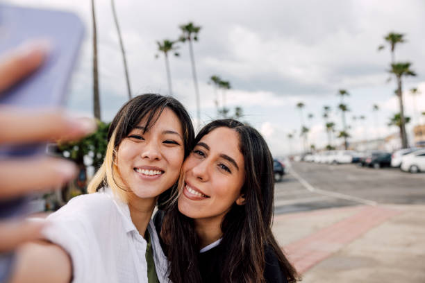 istock Happy women on summer vacation and shoot a selfie 2148157242