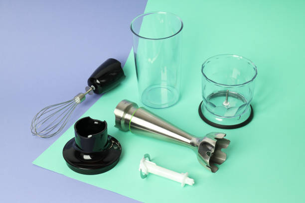 istock Kitchen utensils, parts of a blender on a colored background. 2148157607
