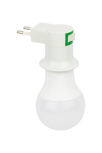 diode light bulb in lamp adapter for socket, plug with socket for light bulb, isolated from background