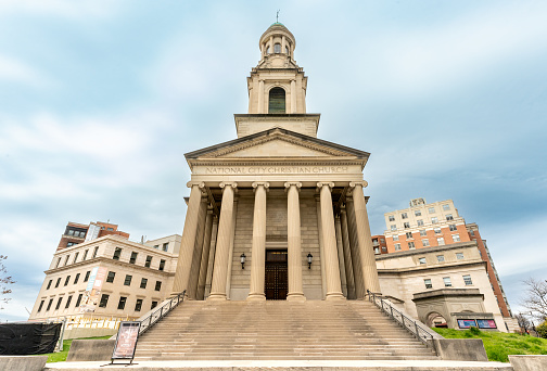 Washington DC - US - Mar 22, 2024  Landscape view of the neoclassical National City Christian Church, with a well-proportioned tower. Notable landmark of Thomas Circle Built in 1930.