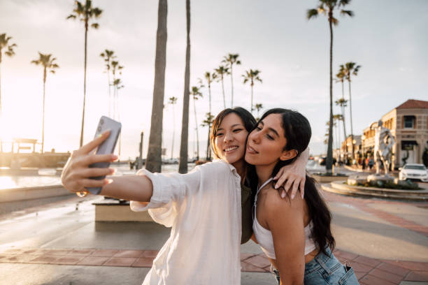 istock Friends shooting a selfie by the beach in California 2148160721