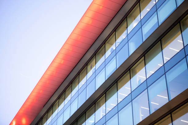 istock Illuminated modern office building exterior at twilight 2148160998