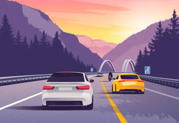 Vector illustration of Vector illustration of a cars driving in the mountains at sunset