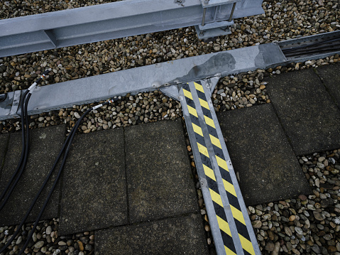 cable infrastructure on a roof, cable tray, gravel