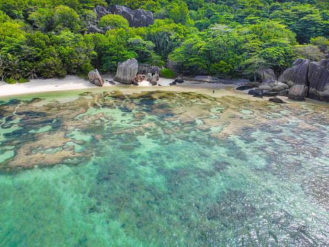 Granite boulders by the sea in Anse Source d'Argent. La Digue island, Seychelles