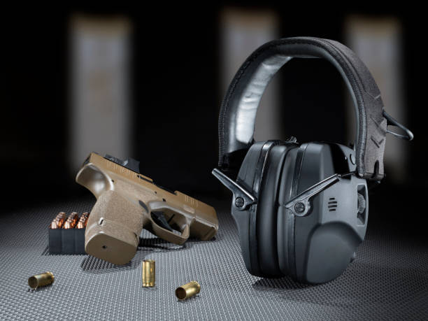 istock Gun and ammo with hearing protection 2148170246
