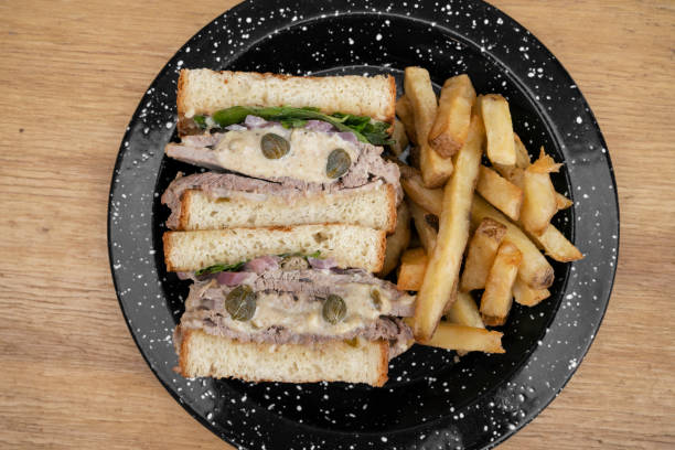 istock A vitel tone meat sandwich with fries 2148170450