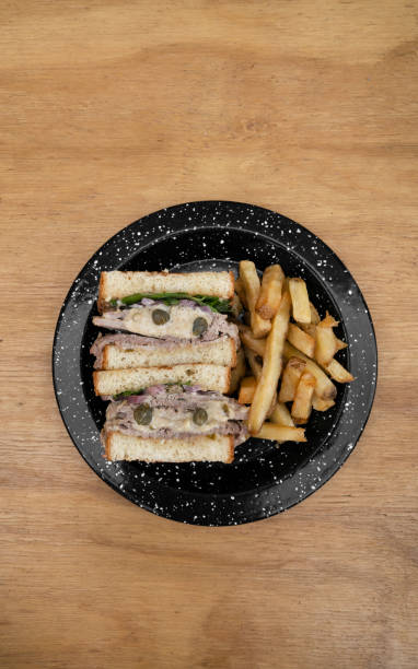 istock A vitel tone meat sandwich with fries 2148170451