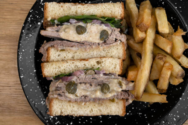 istock A vitel tone meat sandwich with fries 2148170579