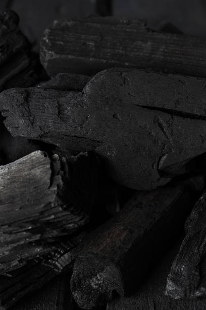 istock Natural black hard wood charcoal, close up 2148171720