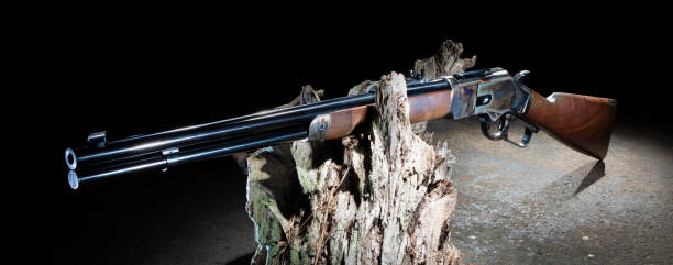 istock Wood stocked old west style lever action rifle 2148171857