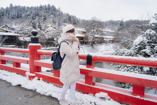 Young tourist Woman have fun traveling at Takayama city, Japan