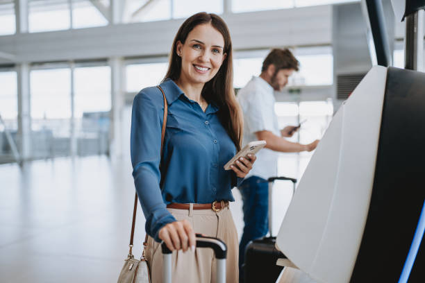 istock Woman checking in at the airport 2148174267