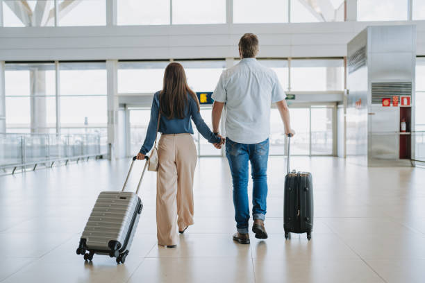 istock Couple at the airport 2148174363