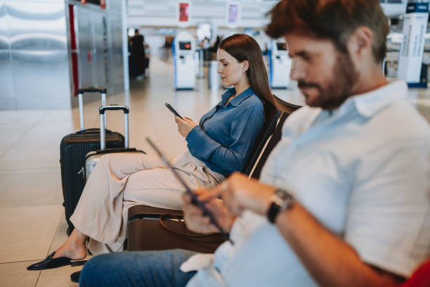 istock People in the airport waiting room 2148174420