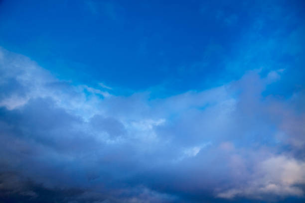 Blue clouds in the blue sky, blue light in the sky