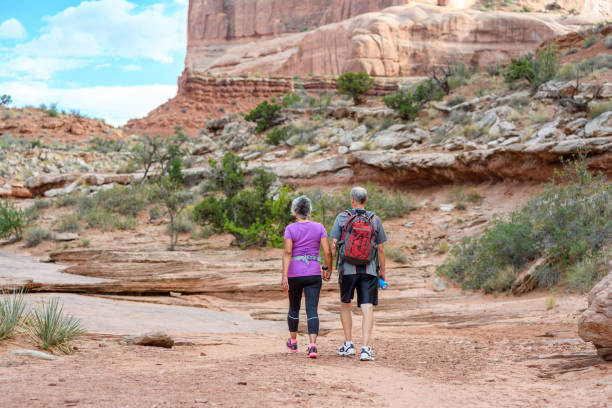 istock Active senior couple hiking in Utah 2148178080