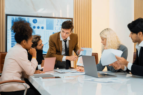 istock Professional smart business team discussion about start up project. Ornamented. 2148178862