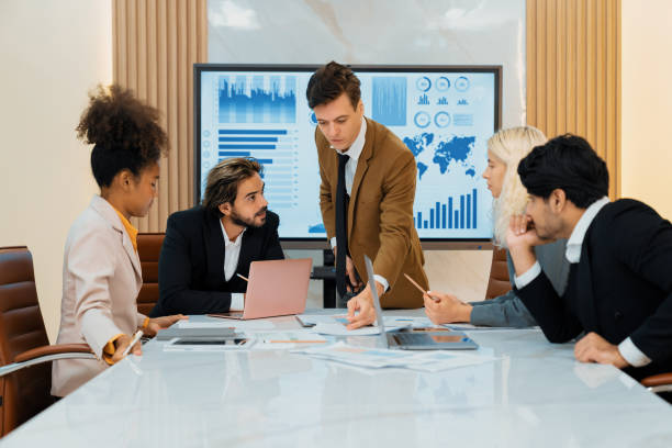 istock Professional smart business team discussion about start up project. Ornamented. 2148179149