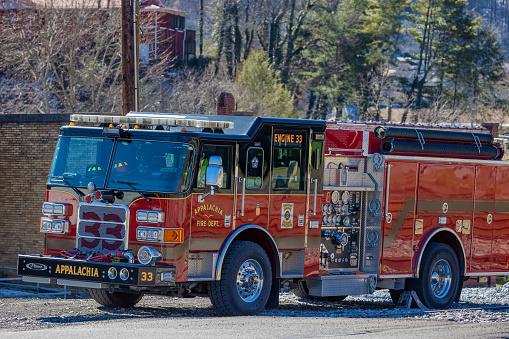 Big Stone Gap, Virginia, USA - Februaty 19, 2024:  A recently washed and shine fire truck sits out in the sunshine downtown.