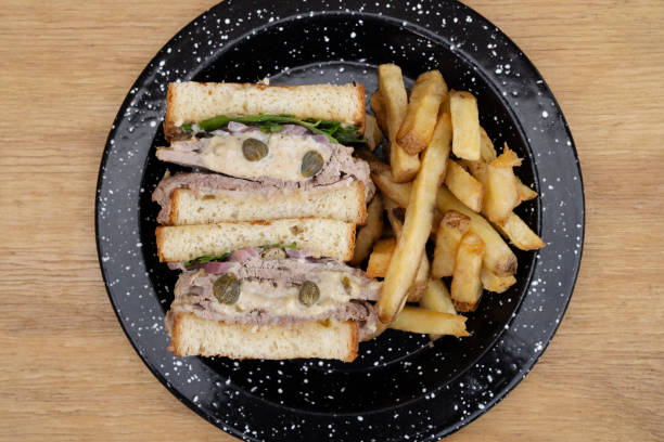 istock A vitel tone meat sandwich with fries 2148181975