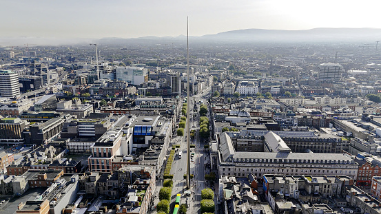 Aerial view of the Dublin spire of symbol, Dublin city centre, Aerial View of the Dublin Spire, O'Connell Street, Ireland

The Dublin Tower, alternatively called the Monument of Light, is a large, 120 meters (390 ft) high, stainless steel, pin-like monument located on the site of the former Nelson's Column (and before it a statue of William Blakeney) on O'Connell Street, the main street of Dublin, Ireland.