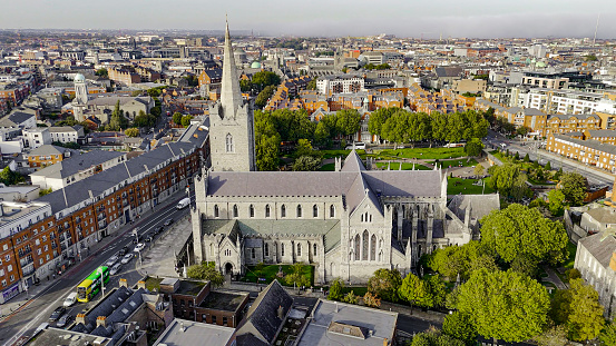 Aerial view of cathedral and park from Saint Patrick's Park-Dublin, Aerial view of historic St. Patrick's Cathedral in the heart of Ireland, Christ Church Cathedral, Aerial view of people walking in saint Patrick park, Public park fountain\n\nSaint Patrick's Cathedral in Dublin, Ireland, founded in 1191 as a Roman Catholic cathedral, is currently the national cathedral of the Church of Ireland. Christ Church Cathedral, also a Church of Ireland cathedral in Dublin, is designated as the local cathedral of the Diocese of Dublin and Glendalough.